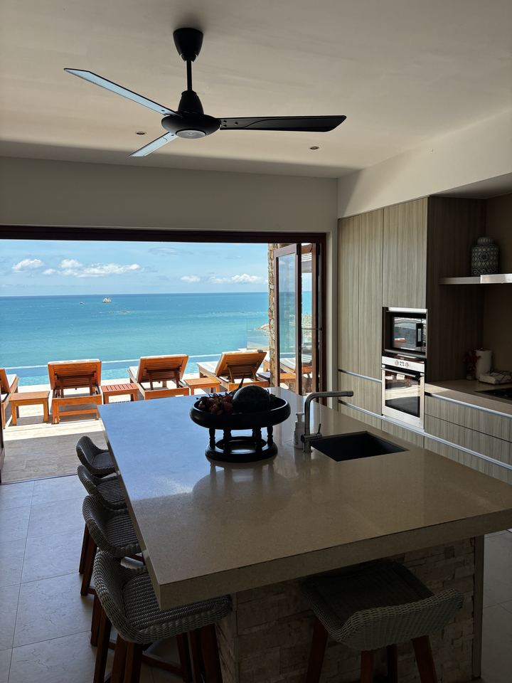Villa Syama kitchen opening onto the sea view, Koh Samui